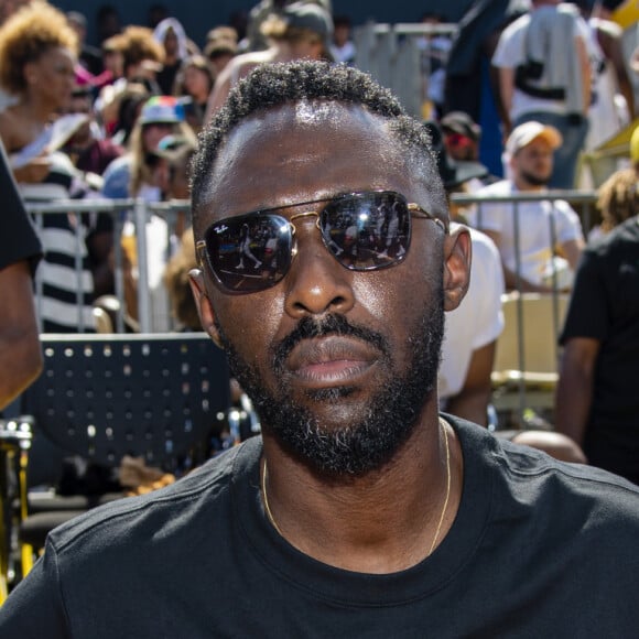 Exclusif - Thomas Ngijol - Personnalités lors de l'événement "Quai 54 World Streetball Championship" sur la pelouse de la rue de Suffren à Paris, France. Le 22 juin 2019. © Pierre Perusseau / Bestimage