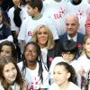 Léonie, âgée de 14 ans (T-shirt bleu ELA) , Brigitte Macron, Jean-Michel Blanquer, ministre de l'éducation nationale lors de la dictée d'ELA lors de sa 16ème édition au Collège Suzanne Lacore à Paris à une classe de 6ème le 14 octobre 2019. Cette dictée est le lancement officiel de la campagne "Mets Tes Baskets et bats la maladie" à l'école. © Dominique Jacovides / Bestimage