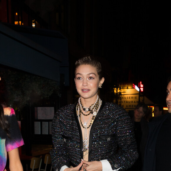 Les top models Gigi Hadid et Mona Tougaard ont participé au défilé Chanel Métiers d'Art et assisté au dîner de l'after-show. Paris, le 4 décembre 2019.