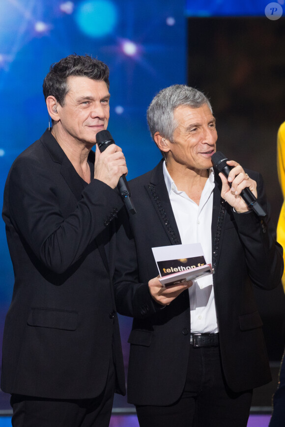 Marc Lavoine, Nagui - Deuxième jour de la 33ème édition du Téléthon au Parc de la Villette à Paris le 7 décembre 2019. Le compteur de la 33ème édition du Téléthon a atteint 74,6 millions d'euros dimanche 8 décembre, en hausse par rapport à l'édition 2018 où l'événement caritatif avait été bousculé par la mobilisation des "gilets jaunes". © Tiziano Da Silva/Bestimage07/12/2019 - Paris