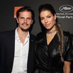 Laury Thilleman (Miss France 2011) et son compagnon Juan Arbelaez au photocall de la soirée "Orange" sur la plage de l'hôtel Majectic lors du 72ème Festival International du Film de Cannes, le 18 mai 2019. © Denis Guignebourg/Bestimage