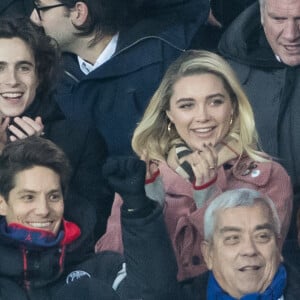 Timothée Chalamet, Florence Pugh dans les tribunes lors du match de Champions League "PSG - Galatasaray (5-0)" au Parc des Princes à Paris, le 11 décembre 2019. © Cyril Moreau/Bestimage