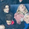 Timothée Chalamet, Florence Pugh dans les tribunes lors du match de Champions League "PSG - Galatasaray (5-0)" au Parc des Princes à Paris, le 11 décembre 2019. © Cyril Moreau/Bestimage