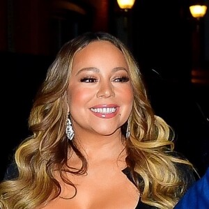 La diva Mariah Carey porte en robe noire pour dîner après un concert de Barbra Streisand à New York, le 3 août 2019.