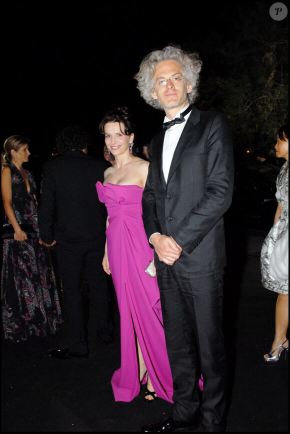 Juliette Binoche et Santiago Amigorena lors de la soirée Chopard pour les 60 aans d Festival de Cannes le 20 mai 2007.