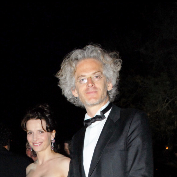 Juliette Binoche et Santiago Amigorena lors de la soirée Chopard pour les 60 aans d Festival de Cannes le 20 mai 2007.