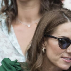 Catherine (Kate) Middleton, duchesse de Cambridge, Meghan Markle, duchesse de Sussex, et Pippa Middleton dans les tribunes lors de la finale femme de Wimbledon "Serena Williams - Simona Halep (2/6 - 2/6) à Londres, le 13 juillet 2019. © Ray Tang/London News Pictures via Zuma Press/Bestimage