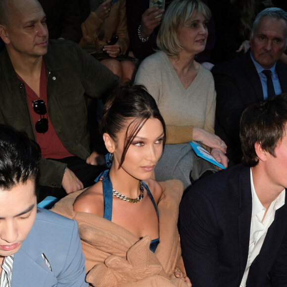 Michael Burke (PDG Louis Vuitton), Kris Wu, Bella Hadid, Alexandre Arnault, Frederic Arnault, Bernard Arnault, Delphine Arnault - Front row du défilé Louis Vuitton Homme automne-hiver 2020/2021 au Jardin des Tuileries à Paris, le 16 janvier 2020. © Olivier Borde / Bestimage