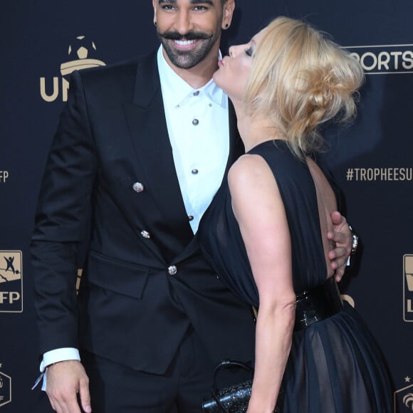 Adil Rami et sa compagne Pamela Anderson au photocall de la 28ème cérémonie des trophées UNFP (Union nationale des footballeurs professionnels) au Pavillon d'Armenonville à Paris, France, le 19 mai 2019. © Coadic Guirec/Bestimage