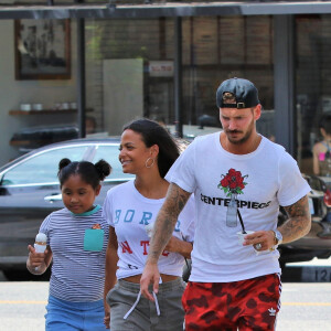 Matt Pokora, sa compagne Christina Milian enceinte et sa fille Violet Nash - Enceinte et radieuse, C.Milian se rend au glacier McConnell avec compagnon M.Pokora et sa fille V.Nash pour le goûter après avoir acheté des vêtements pour bébés. La chanteuse 'Dip it Low' et son compagnon ont annoncé sa grossesse la semaine dernière via Instagram. C'est le premier enfant du couple et le premier enfant de M.Pokora. Los Angeles, le 3 août 2019.