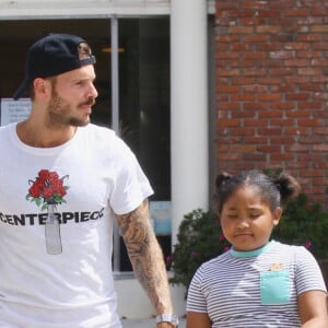 Matt Pokora, sa compagne Christina Milian enceinte et sa fille Violet Nash - Enceinte et radieuse, C.Milian se rend au glacier McConnell avec compagnon M.Pokora et sa fille V.Nash pour le goûter après avoir acheté des vêtements pour bébés. La chanteuse 'Dip it Low' et son compagnon ont annoncé sa grossesse la semaine dernière via Instagram. C'est le premier enfant du couple et le premier enfant de M.Pokora. Los Angeles, le 3 août 2019.