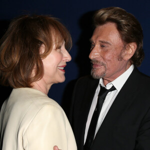 Nathalie Baye et Johnny Hallyday - Avant-première de 'Salaud on t'aime' à l'UGC Normandie sur les Champs-Elysées à Paris le 31 mars 2014
