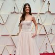 Camila Morrone assiste à la 92e édition des Oscars au Dolby Theatre, habillée d'une robe Carolina Herrera. Hollywood, Los Angeles, le 9 février 2020.