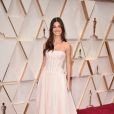 Camila Morrone assiste à la 92e édition des Oscars au Dolby Theatre, habillée d'une robe Carolina Herrera. Hollywood, Los Angeles, le 9 février 2020.