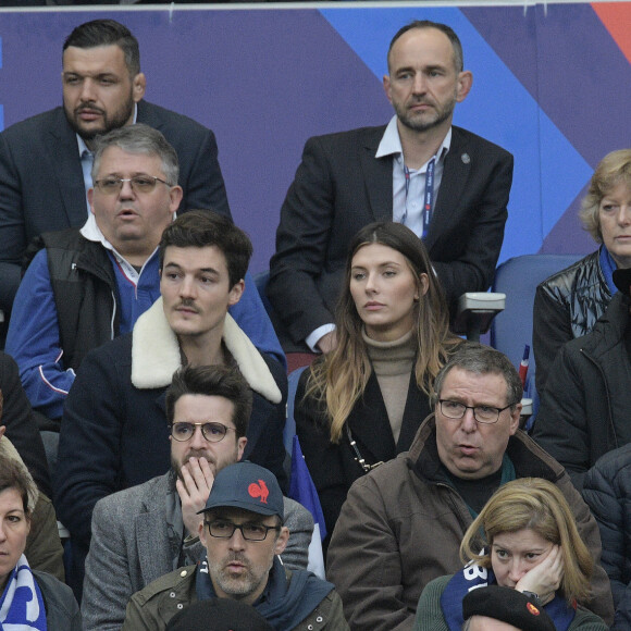 Camille Cerf et son compagnon Cyrille Roty dans les tribunes lors du match de rugby du tournoi des six nations opposant la France à l'Angleterre au stade de France à Saint-Denis, Seine Saint-Denis, France, le 2 février 2020. la France a gagné 24-17. © Giancarlo Gorassini/Bestimage
