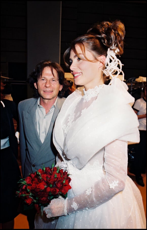 Emmanuelle Seigner et Roman Polanski au défilé de mode Lolita Lempicka à Paris en 1995.