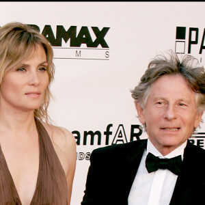 Emmanuelle Seigner et Roman Polanski à la soirée de l'amfAR au Festival de Cannes en 2005.