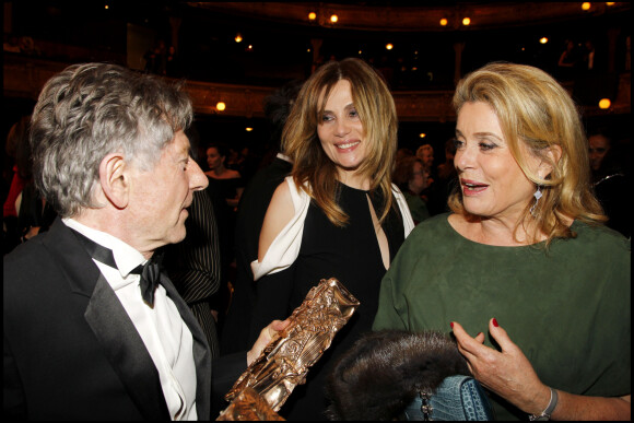 Emmanuelle Seigner, Roman Polanski et Catherine Deneuve aux César en 2011.