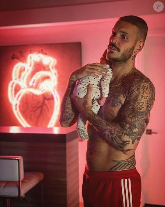 M. Pokora avec son fils Isaiah dans les bras le 12 février 2020.