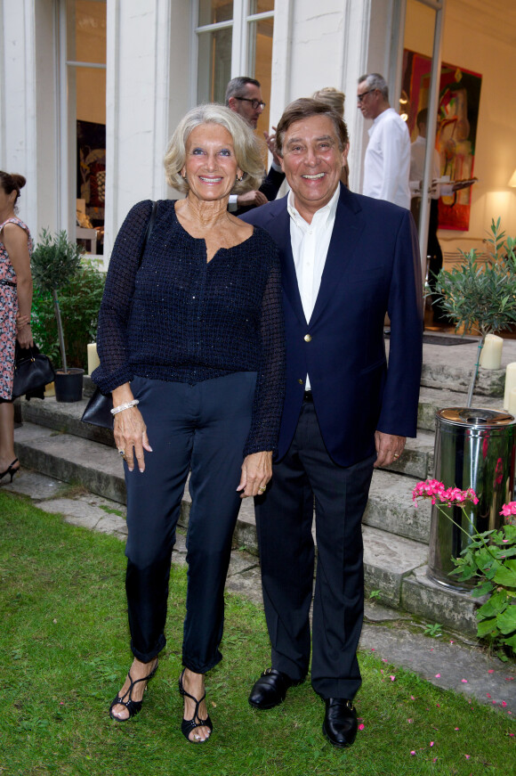 Exclusif - Jean-Pierre Foucault et sa femme Evelyne  Soirée en l'honneur du "Royal Palm de Marrakech" à Paris le 17 septembre 2014.