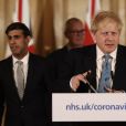 Rishi Sunak, Chancelier de l'Échiquier - Le premier ministre Boris Johnson lors d'une conférence de presse à propos de l'épidémie de Coronavirus (COVID-19) à Londres le 17 Mars 2020.