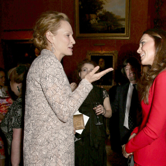 Kate Middleton, la duchesse de Cambridge, Uma Thurman à Buckingham le 17 février 2014.