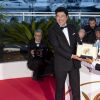 Bong Joon-ho, Song Kang-ho (Palme d'Or pour le film "Parasite") au photocall des lauréats, après la cérémonie de clôture du 72ème Festival International du Film de Cannes, le 25 mai 2019.