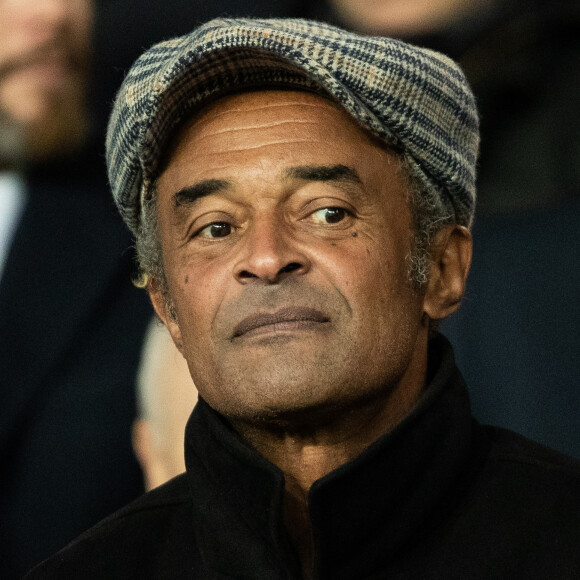 Yannick Noah - People dans les tribunes du match de football de Ligue 1 "PSG-Lyon" à Paris. Le 9 février 2020.