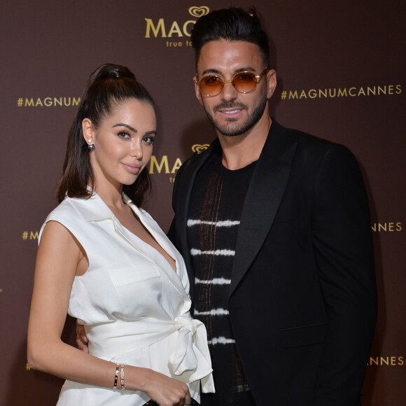 Nabilla Benattia (enceinte) et son mari Thomas Vergara au photocall de l'after party "Magnum x Rita Ora" sur la plage privée Magnum lors du 72ème Festival International du Film de Cannes, France,le 16 mai 2019. © Veeren/Bestimage