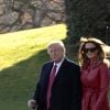 Le président américain Donald J. Trump et la première dame Melania Trump marchent sur la pelouse sud de la Maison Blanche à Washington DC, États-Unis, le vendredi 14 février 2020, alors qu'ils partent pour un week-end à Mar-a- Lago.
