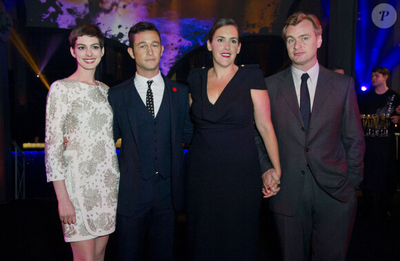 <p>Anne Hathaway, Joseph Gordon-Levitt, Christopher Nolan et Emma Thomas - Soirée après la première du film "The Dark Knight Rises" au Freemasons Hall à Londres. Le 18 juillet 2012.</p>