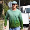 Exclusif - Brad Pitt , pull vert et casquette assortie se rend à un meeting à Los Angeles le 21 Février 2020.