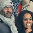 Exclusif - Amel Bent et son compagnon Patrick Antonelli assistent au match de Ligue des Champions PSG - Olympiakos Le Pirée au Parc des Princes à Paris le 27 novembre 2013.