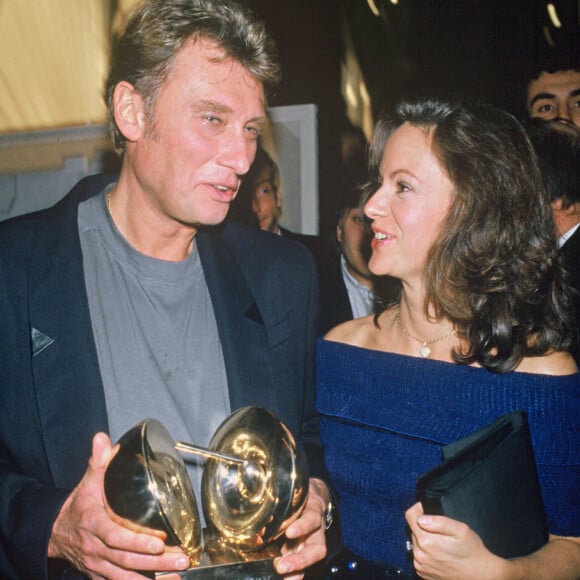 Gisèle Galante et Johnny Hallyday à la cérémonie des Victoires de la Musique en 1987.