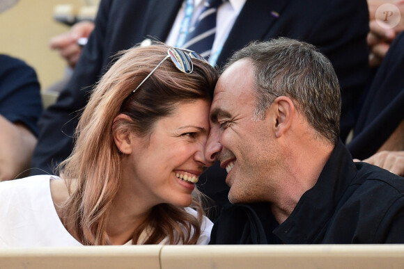 Nikos Aliagas et sa femme Tina dans les tribunes lors des internationaux de tennis de Roland Garros à Paris, France, le 31 mai 2019. © Jean-Baptiste Autissier/Panoramic/Bestimage