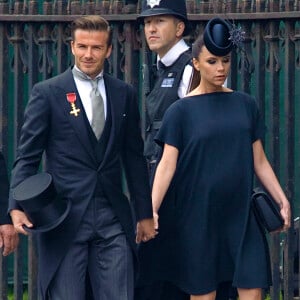 David et Victoria Beckham, enceinte de leur 4e enfant (une fille qu'ils prénommeront Harper) assitent au mariage du prince William et de Kate Middleton à l'abbaye de Westminster. Londres, le 29 avril 2011.