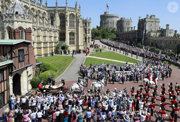 Le prince Harry, duc de Sussex, et Meghan Markle, duchesse de Sussex, lors de leur mariage au château de Windsor, Royaume Uni, le 19 mai 2018.