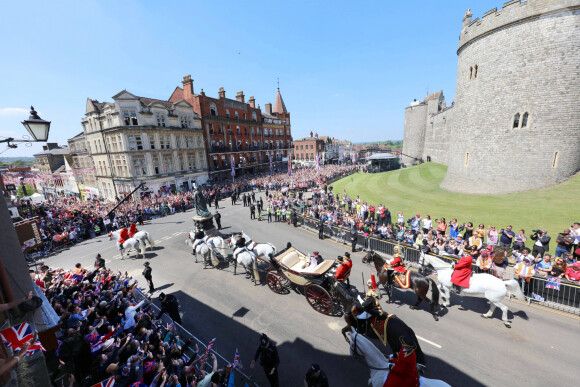Le prince Harry, duc de Sussex, et Meghan Markle, duchesse de Sussex, lors de leur mariage au château de Windsor, Royaume Uni, le 19 mai 2018.