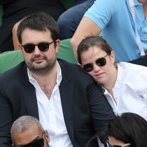 Jean-François Piège et sa femme Elodie Tavares (enceinte) - People au village des Internationaux de France de tennis de Roland Garros à Paris. Le 29 mai 2015