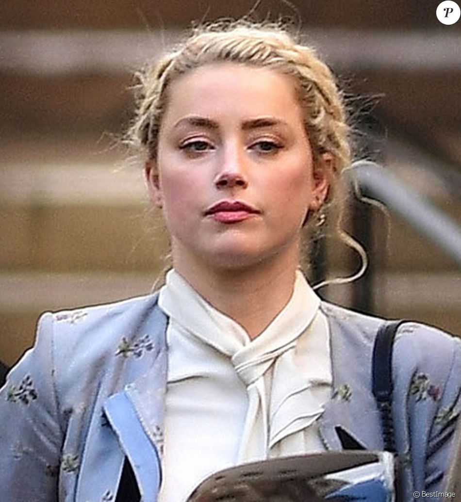 Amber Heard - J. Depp et A. Heard sortent de la cour royale de justice à Londres, pour le procès en diffamation contre le magazine The Sun Newspaper. Le 21 juillet 2020.