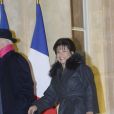Pierre Nora et Anne Sinclair arrivent au Palais de l'Elysée à Paris le 9 décembre 2013. L'historien Pierre Nora a été décoré Grand officier de la Légion d'honneur par le président François Hollande.   