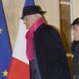 Pierre Nora et Anne Sinclair arrivent au Palais de l'Elysée à Paris le 9 décembre 2013. L'historien Pierre Nora a été décoré Grand officier de la Légion d'honneur par le président François Hollande.   