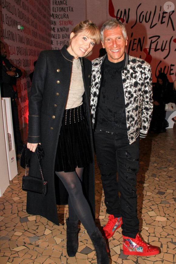 Nagui et sa femme Mélanie Page lors du vernissage de l'exposition consacrée à l'oeuvre et l'imaginaire de Christian Louboutin "l'Exhibitionniste' (L'Exibition[niste]) au Palais de la Porte Dorée, à Paris, France, le 24 février 2020. © Philippe Baldini/Bestimage