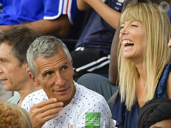 Nagui et sa femme Mélanie Page dans les tribunes lors du quart de finale de la Coupe du Monde Féminine de football opposant les Etats-Unis à la France au Parc des Princes à Paris, France, le 28 juin 2019. Les USA ont gagné 2-1. © Pierre Perusseau/Bestimage 