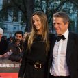 Anna Elisabet Eberstein et son mari Hugh Grant à la première du film "The Irishman" lors de la clôture du 63ème Festival International du Film de Londres (BFI), le 13 octobre 2019.