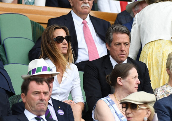 Hugh Grant et sa femme Anna Elisabet Eberstein - Les célébrités dans les tribunes de Wimbledon à Londres, le 12 juillet 2019.