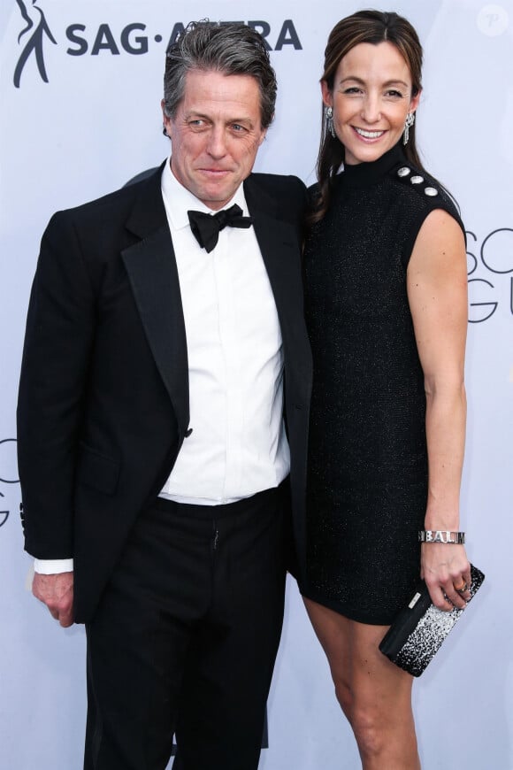 Hugh Grant et sa femme Anna Elisabet Eberstein - Photocall - 25ème cérémonie annuelle des Screen Actors Guild Awards au Shrine Audritorium à Los Angeles, le 27 janvier 2019.