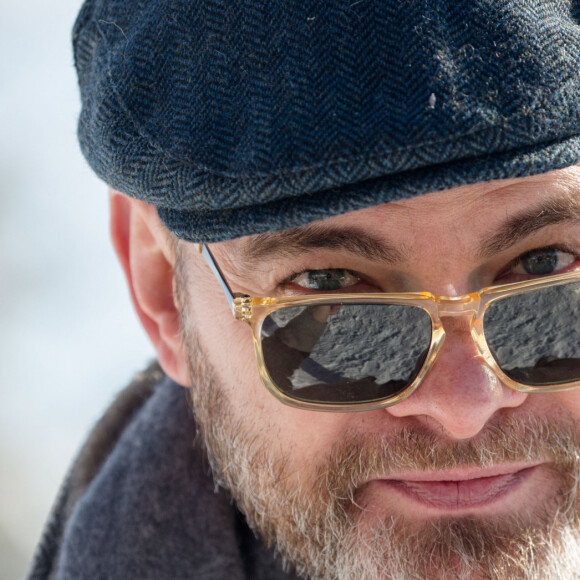 Clovis Cornillac au photocall du film "Le Temps Des Marguerites" lors du 23e festival international du film de comédie de l'Alpe d'Huez, le 18 janvier 2020. © Cyril Moreau/Bestimage