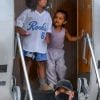 Saint West, Chicago West - K. Kardashian et K. West arrivent avec leurs enfants en jet privé à Miami en provenance de La république dominicaine où ils ont passé des vacances, le 9 août 2020