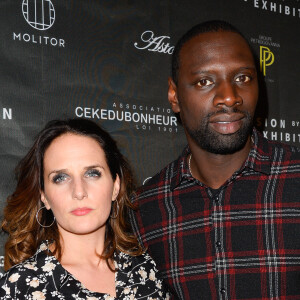 Omar Sy et sa femme Hélène au vernissage de l'exposition "Vision by AG", au profit de l'association caritative CeKeDuBonheur, à la Piscine Molitor à Paris, le 30 novembre 2016. © Guirec Coadic/Bestimage 